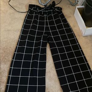 Black dress pants with matching belt.